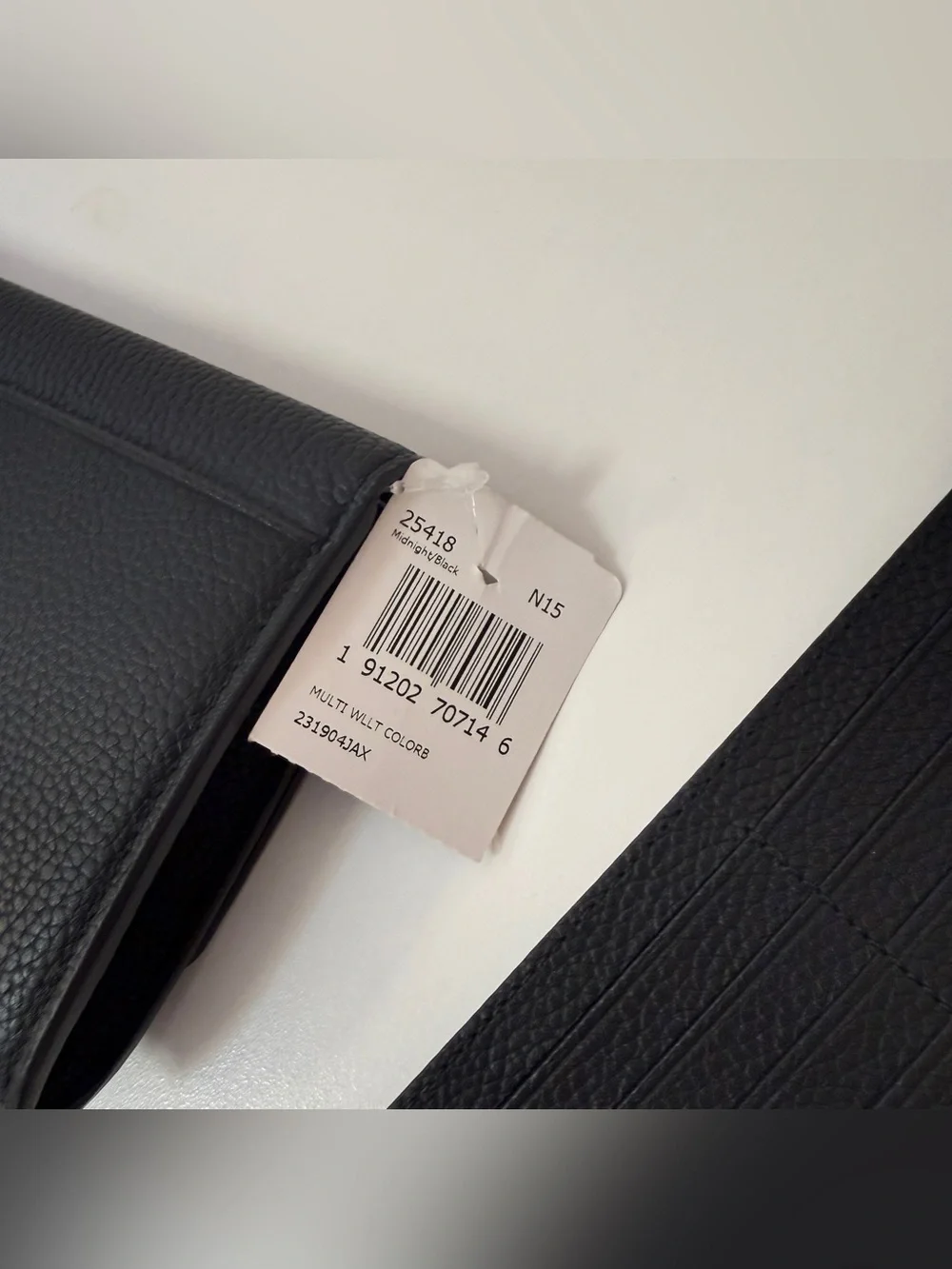 Coach sleek black